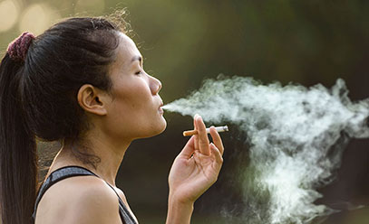 Woman smoking a cigarette